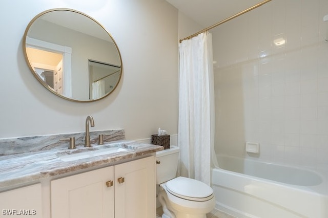 full bathroom with shower / bath combo, vanity, and toilet