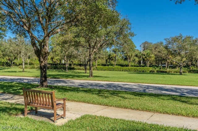 surrounding community featuring a lawn