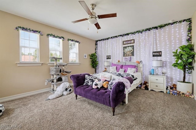 bedroom with ceiling fan and carpet