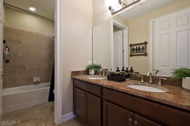 3290 Banyon Hollow Loop, North Fort Myers, FL 33903 - bathroom featuring double vanity, shower / bath combo, tile patterned floors, and recessed lighting