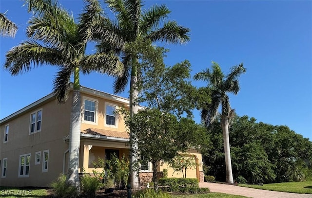 view of home's exterior with stucco siding