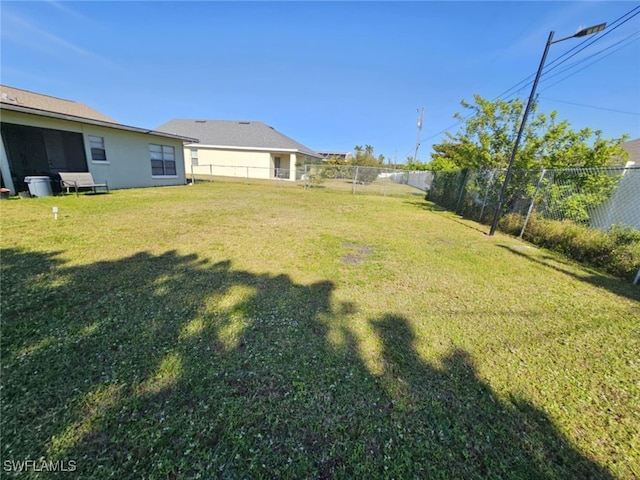 2935 SW 1st Pl, Cape Coral, FL 33914 - view of yard featuring a fenced backyard