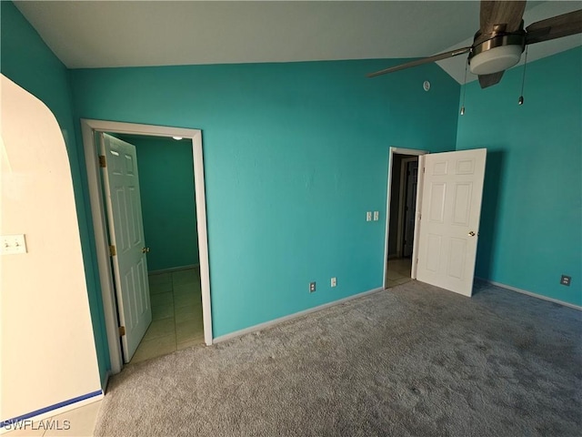2935 SW 1st Pl, Cape Coral, FL 33914 - unfurnished bedroom featuring baseboards, carpet, ceiling fan, and vaulted ceiling