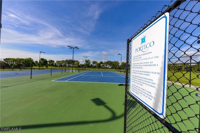 view of sport court featuring basketball court