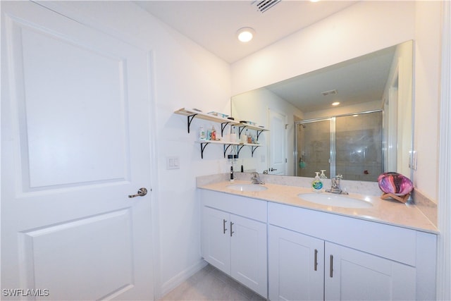 bathroom featuring vanity and walk in shower