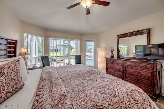 bedroom with ceiling fan and access to exterior