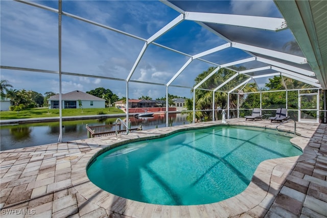 view of swimming pool featuring a lanai, a patio area, and a water view