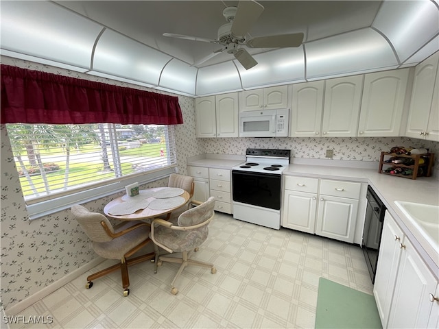 kitchen with white cabinets, white appliances, and ceiling fan