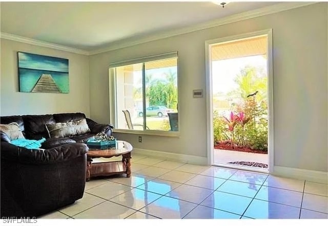 living room with light tile patterned floors and ornamental molding