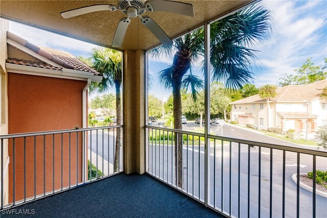 balcony featuring ceiling fan