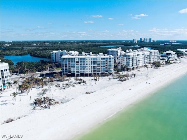 bird's eye view with a view of the beach and a water view