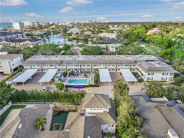 birds eye view of property featuring a water view