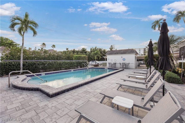 view of pool featuring a patio