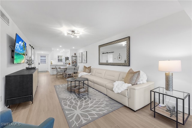 living room with hardwood / wood-style flooring