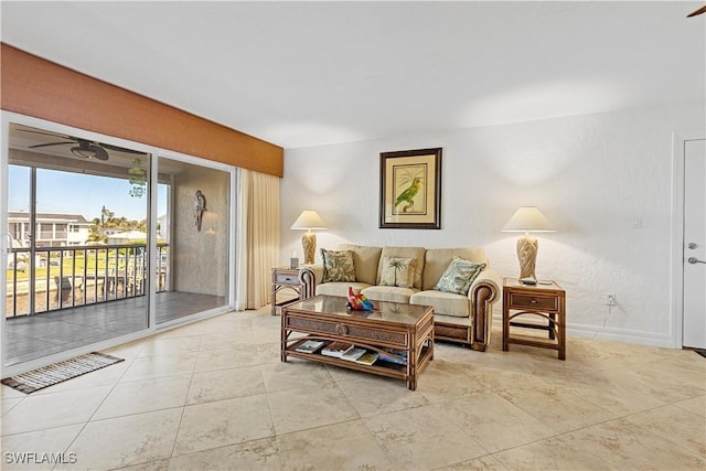 909 SE 46th Ln Unit 207, Cape Coral, FL 33904 - tiled living area with baseboards