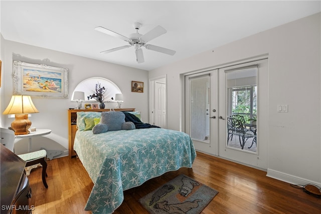 bedroom featuring access to exterior, french doors, ceiling fan, hardwood / wood-style flooring, and a closet