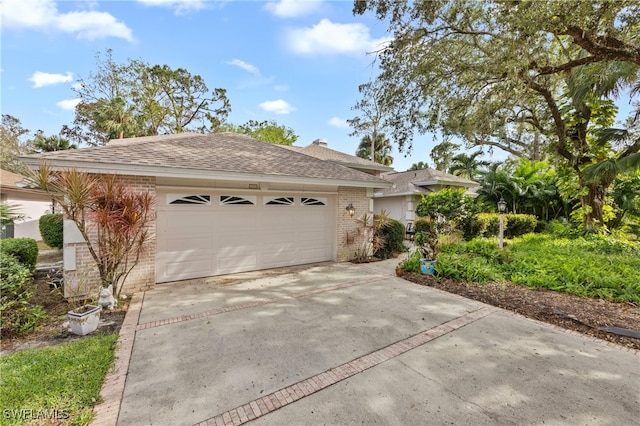 ranch-style house featuring a garage