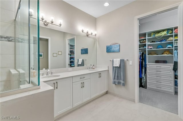 bathroom with vanity and walk in shower