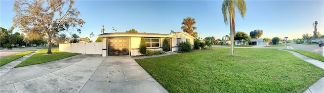 view of side of home with a lawn