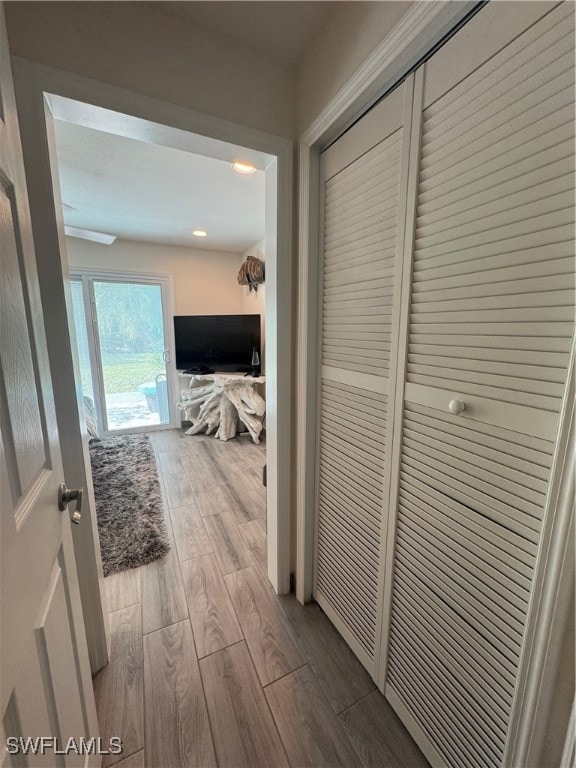 corridor featuring hardwood / wood-style flooring