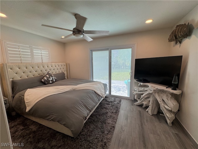 bedroom featuring wood-type flooring, access to outside, and ceiling fan