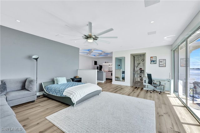 bedroom with ceiling fan, access to exterior, light wood-type flooring, and coffered ceiling