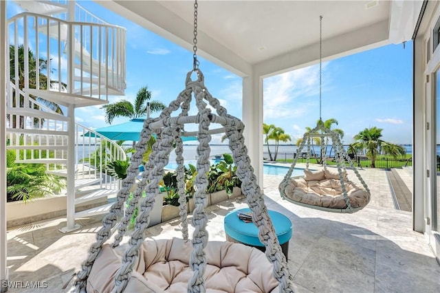 view of patio / terrace featuring a fenced in pool