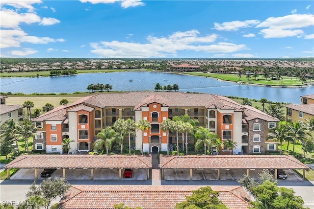 bird's eye view with a water view