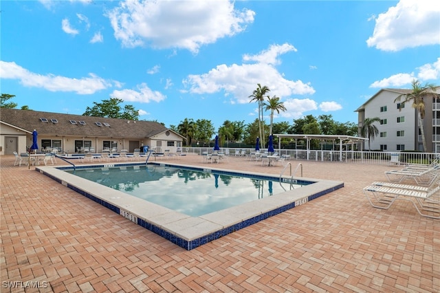 view of pool featuring a patio area