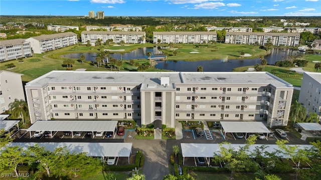 bird's eye view with a water view