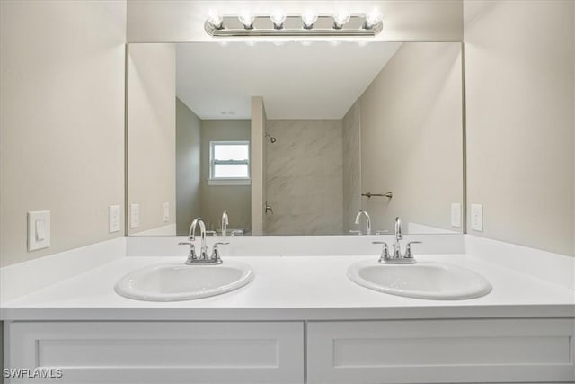 2902 40th St W, Lehigh Acres, FL 33971 - bathroom featuring double vanity and a shower