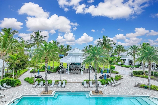 view of swimming pool with a gazebo and a patio area