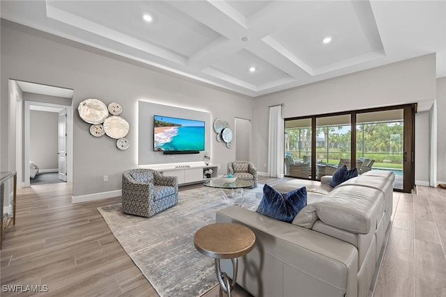 living room with beam ceiling, light hardwood / wood-style floors, and coffered ceiling