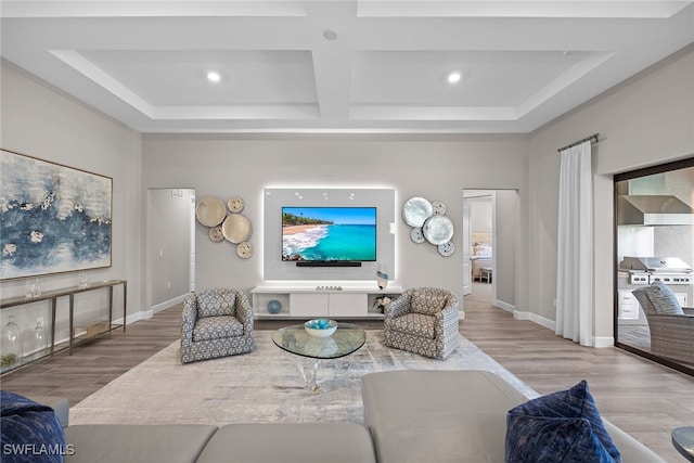 living room featuring hardwood / wood-style flooring and coffered ceiling