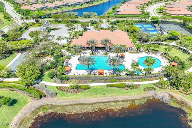 birds eye view of property with a water view