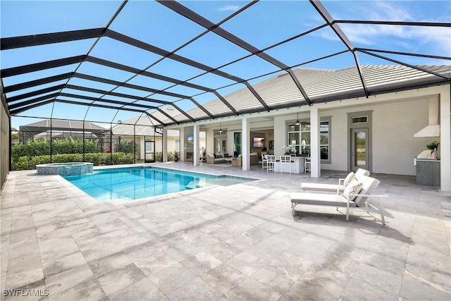 view of swimming pool featuring an outdoor living space, ceiling fan, a lanai, an in ground hot tub, and a patio