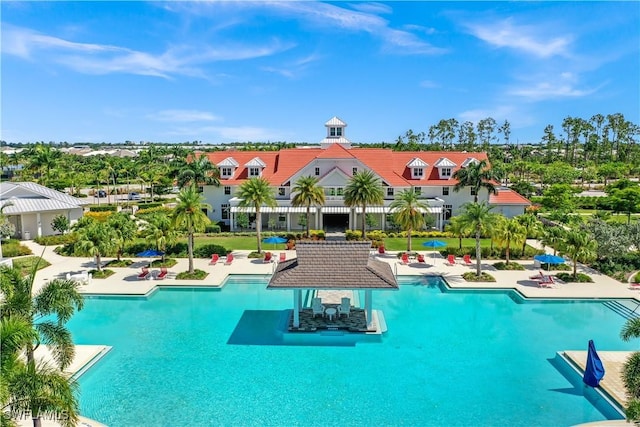 view of swimming pool featuring a patio area