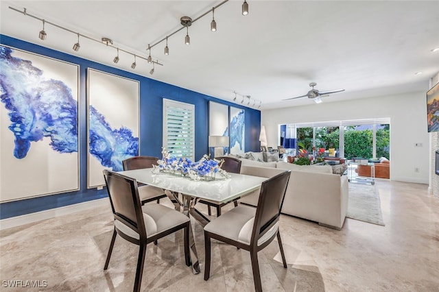 dining space featuring ceiling fan