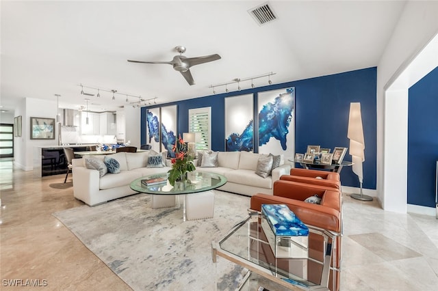 living room with ceiling fan