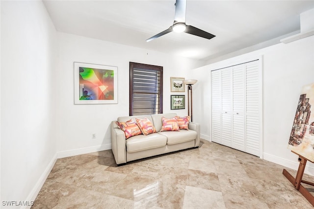 living room featuring ceiling fan