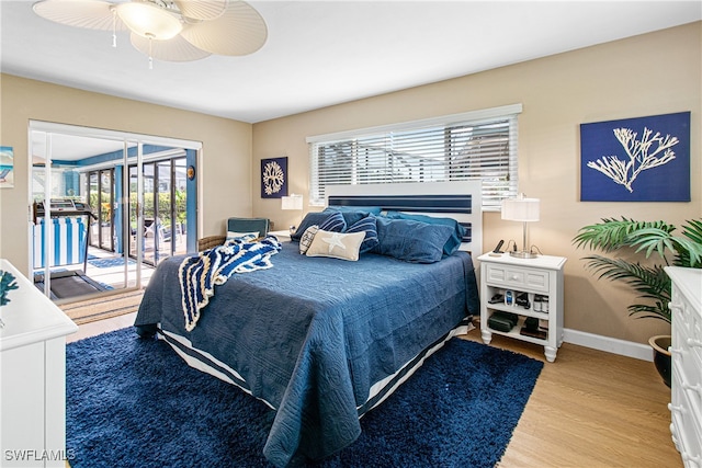 bedroom featuring access to outside, ceiling fan, and light hardwood / wood-style flooring