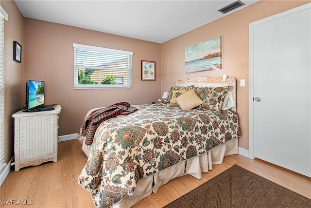 bedroom featuring light hardwood / wood-style floors