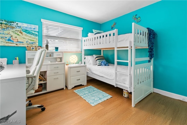 bedroom with light hardwood / wood-style flooring