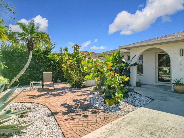 550 110th Ave N, Naples, FL 34108 - view of patio / terrace