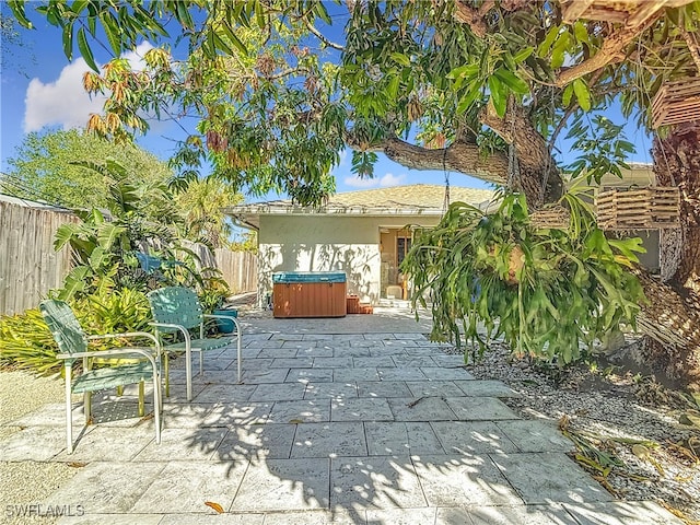 view of patio featuring a hot tub