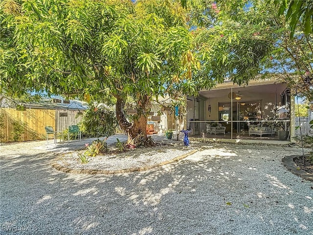 550 110th Ave N, Naples, FL 34108 - view of front of property with a patio area and ceiling fan