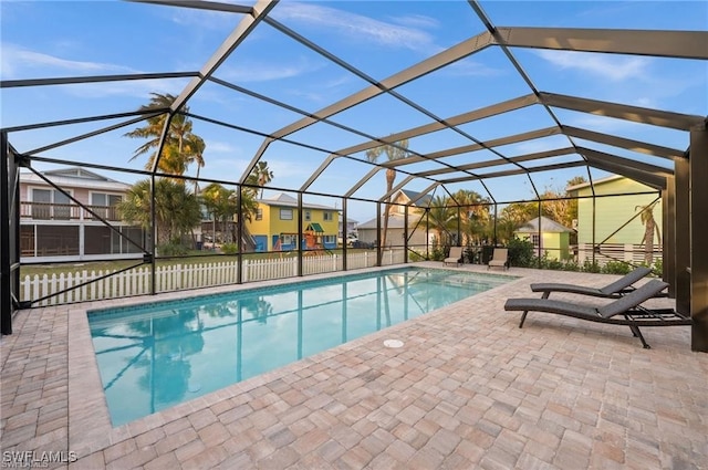 view of pool featuring a patio and a lanai