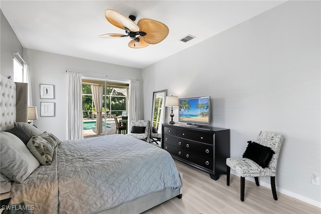 bedroom with light hardwood / wood-style flooring and ceiling fan