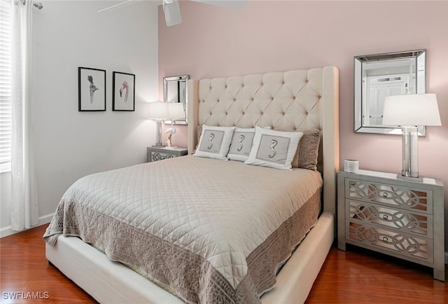 bedroom featuring ceiling fan and wood-type flooring