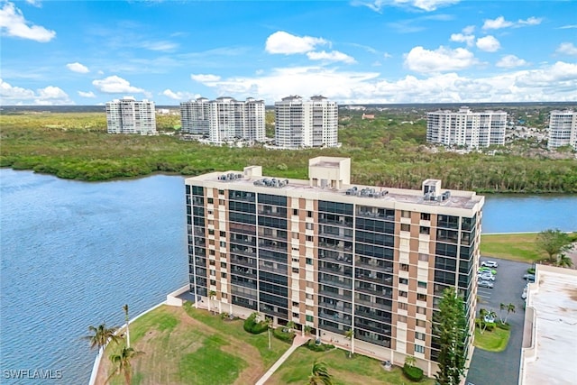 birds eye view of property featuring a water view